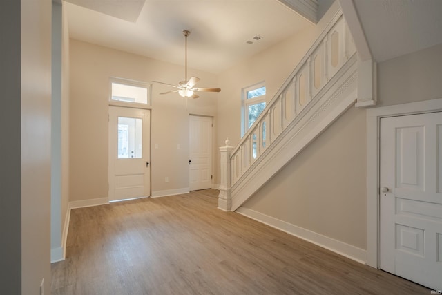 foyer featuring light hardwood / wood-style floors and ceiling fan