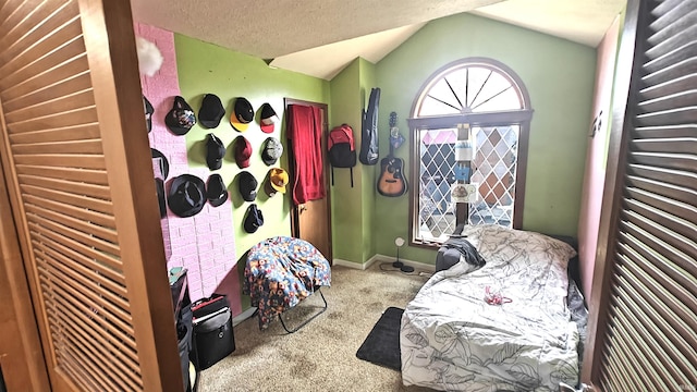 carpeted bedroom featuring vaulted ceiling