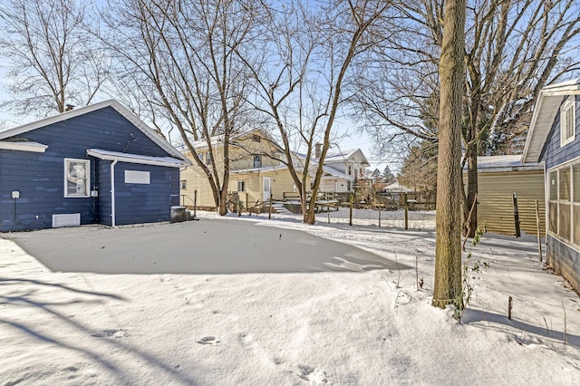 view of yard covered in snow