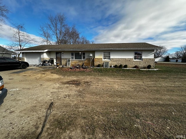 single story home with a garage