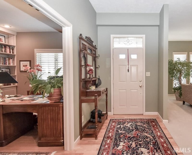 entrance foyer featuring light hardwood / wood-style floors