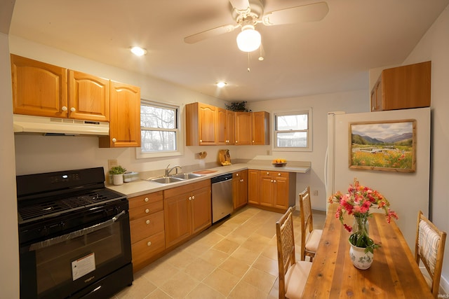 kitchen with black gas stove, a sink, light countertops, under cabinet range hood, and stainless steel dishwasher