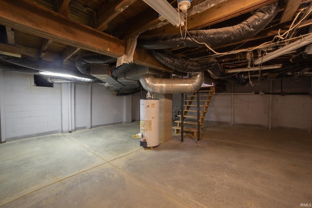 unfinished basement featuring water heater