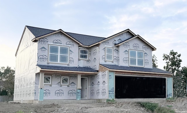 property in mid-construction featuring a garage