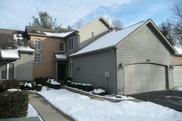 exterior space with a garage