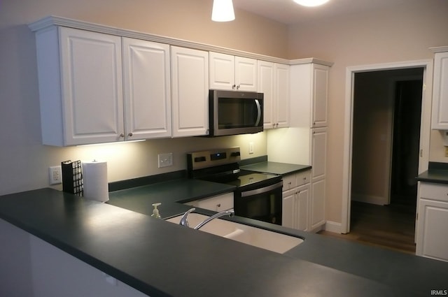 kitchen featuring white cabinets, sink, and stainless steel appliances