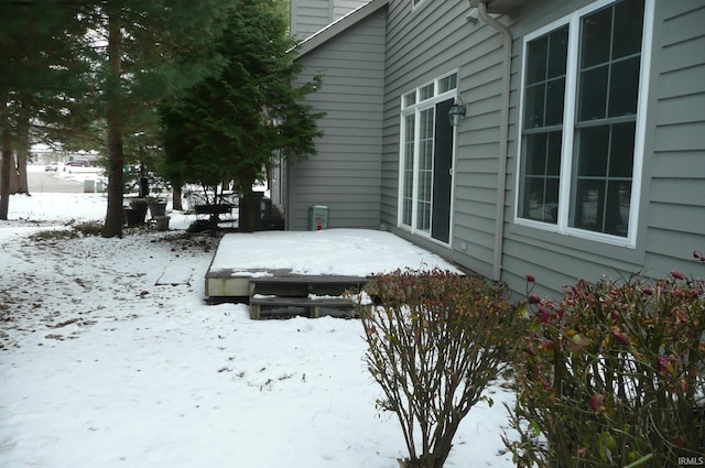 view of yard layered in snow