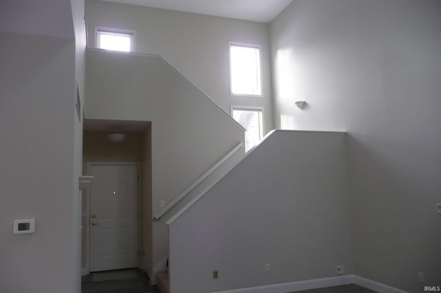 staircase with plenty of natural light