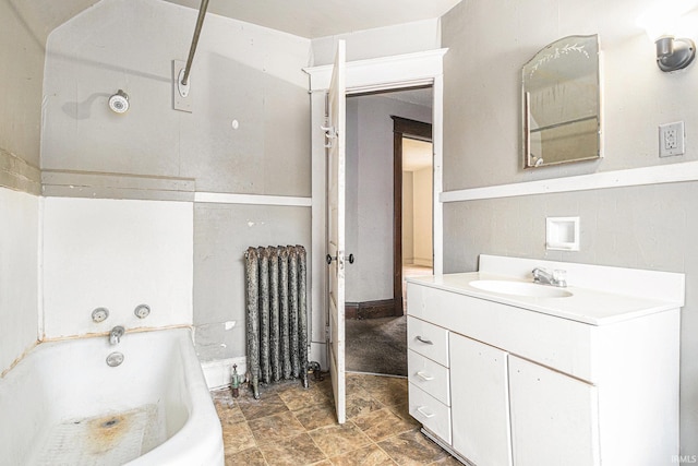 bathroom featuring vanity and radiator