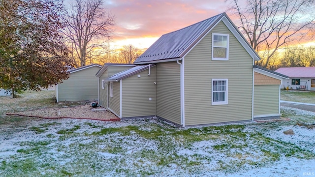 view of snow covered house