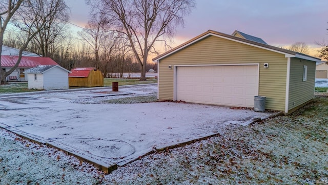 view of snow covered garage