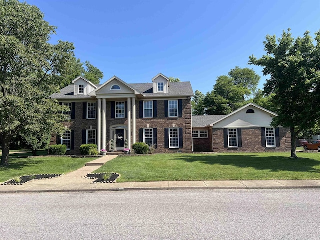 view of front of house featuring a front lawn