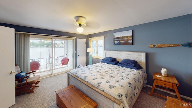 bedroom featuring access to exterior, ceiling fan, and carpet floors