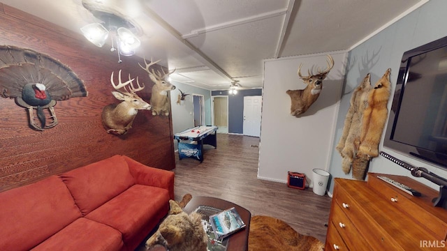 living room featuring hardwood / wood-style flooring and ceiling fan