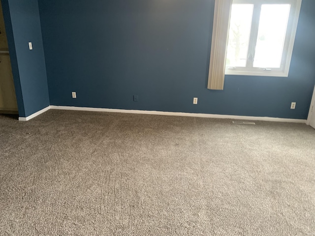 view of carpeted spare room