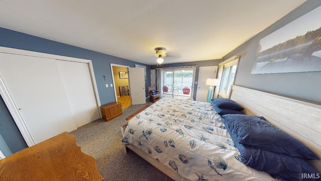 carpeted bedroom featuring a closet