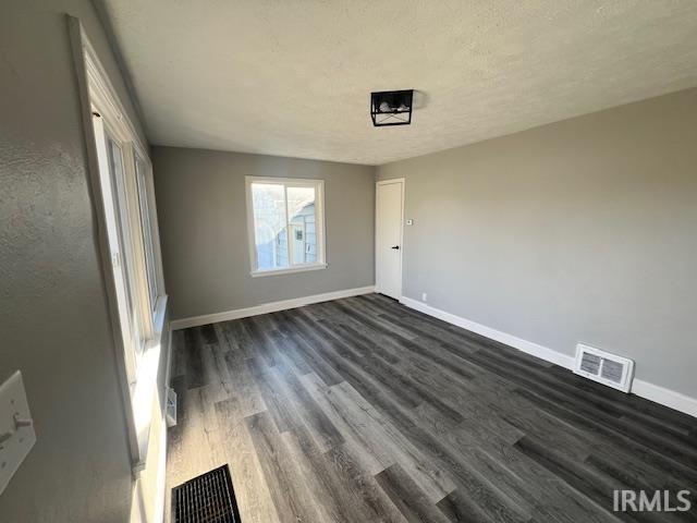 interior space featuring dark wood-type flooring