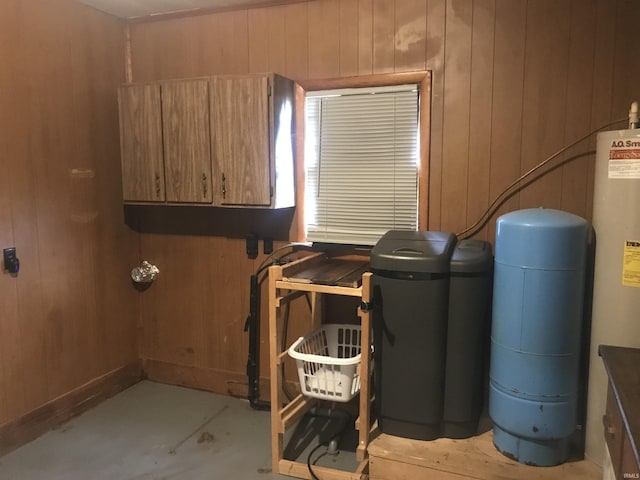 washroom featuring wooden walls