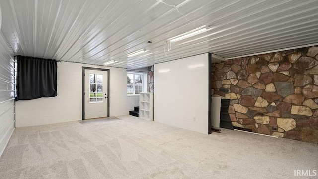 basement with carpet flooring