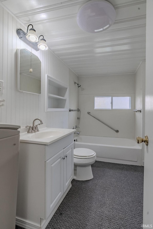 full bathroom featuring shower / bathing tub combination, vanity, wood walls, and toilet