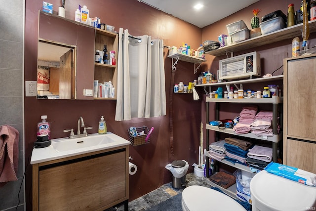 bathroom with vanity and toilet