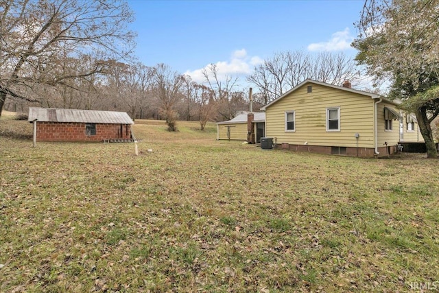 view of yard featuring central AC unit