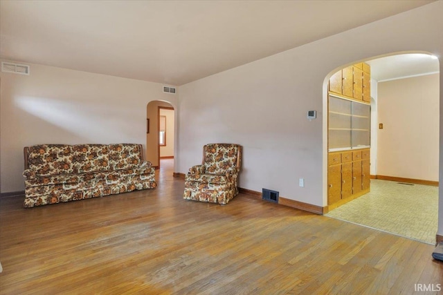 unfurnished room featuring wood-type flooring