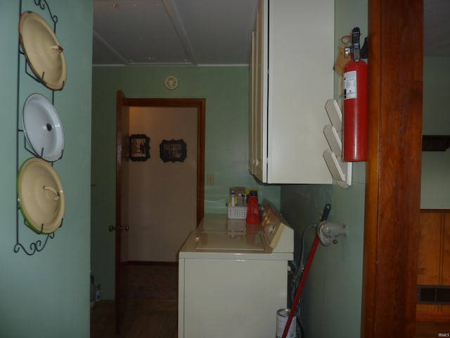 clothes washing area featuring washer / dryer