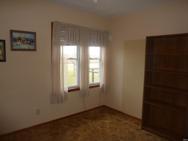 view of carpeted spare room