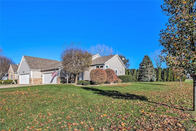 front of property with a garage and a front yard