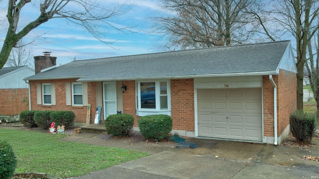 single story home with a garage