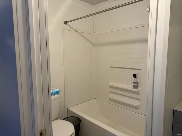 bathroom featuring bathing tub / shower combination and toilet