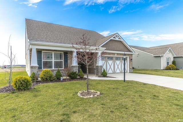 craftsman house featuring a front yard and a garage