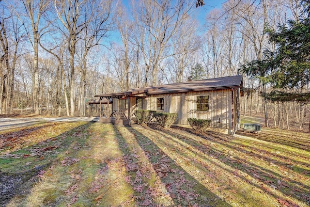 ranch-style home featuring a front yard