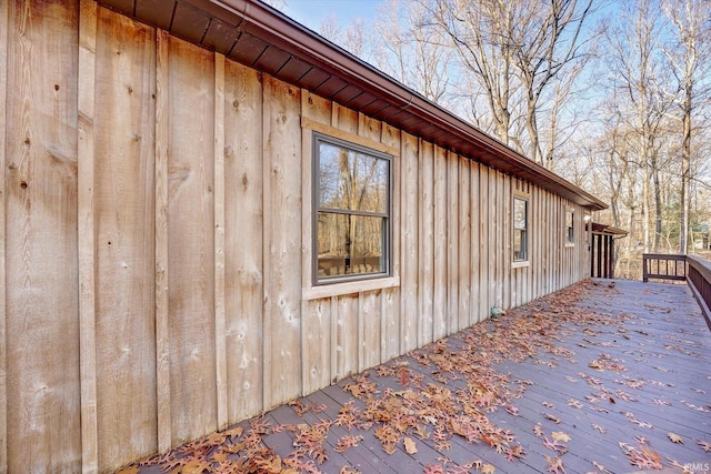 view of home's exterior with a wooden deck