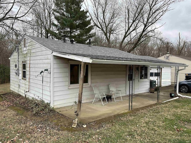 exterior space with cooling unit and a patio