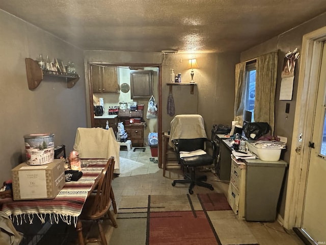 office space with a textured ceiling