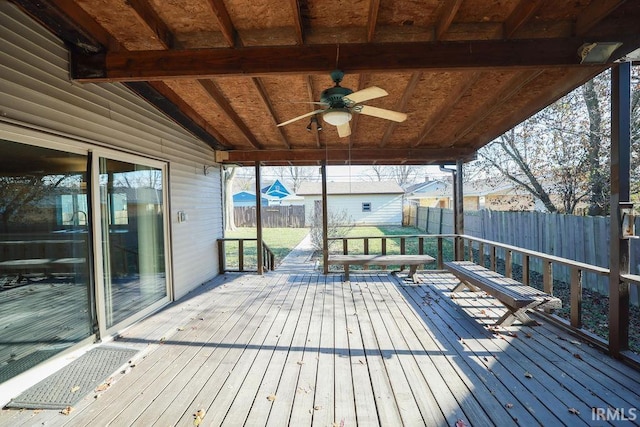 wooden terrace featuring ceiling fan