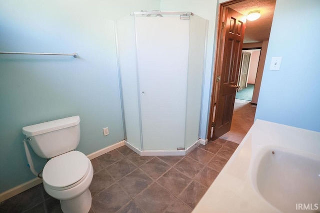 bathroom with tile patterned floors, vanity, and toilet