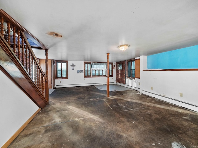 garage with a baseboard heating unit