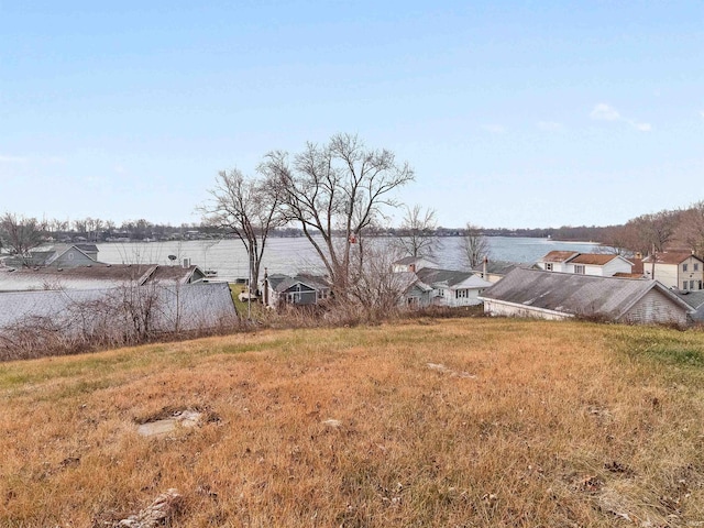 view of yard with a water view