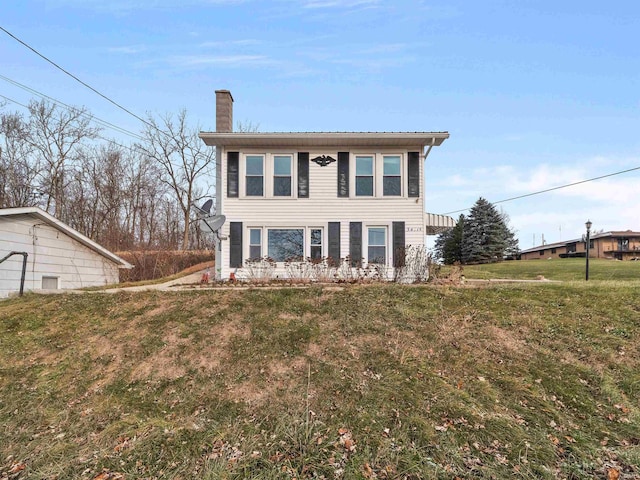 view of front of property with a front lawn