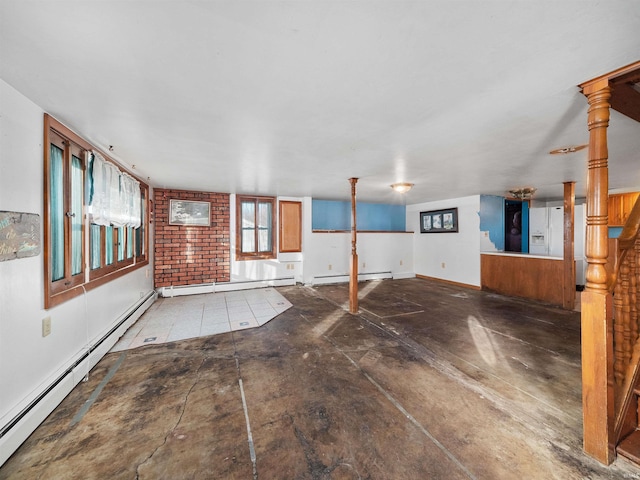 interior space featuring concrete floors and baseboard heating