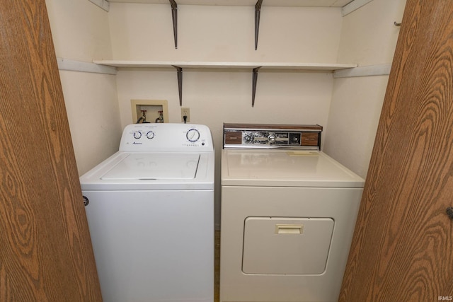 laundry room featuring washing machine and clothes dryer