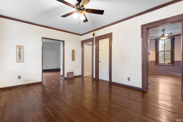 spare room featuring ceiling fan, ornamental molding, and dark wood-type flooring