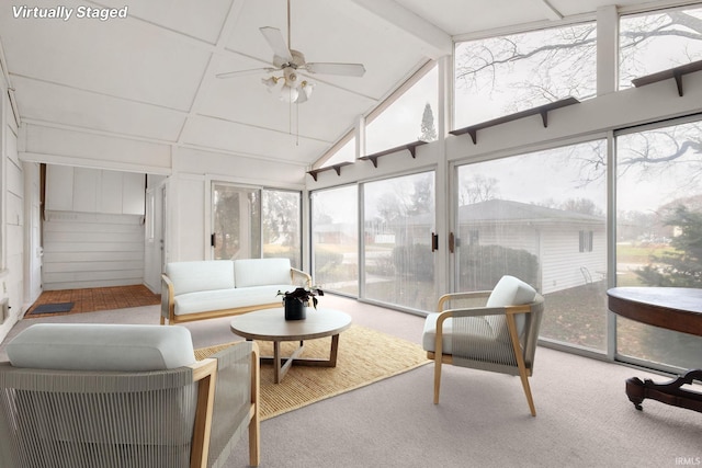 sunroom with vaulted ceiling and ceiling fan