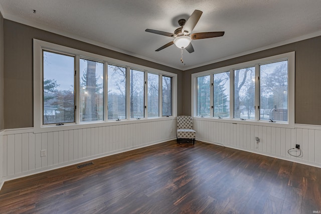 interior space with ceiling fan