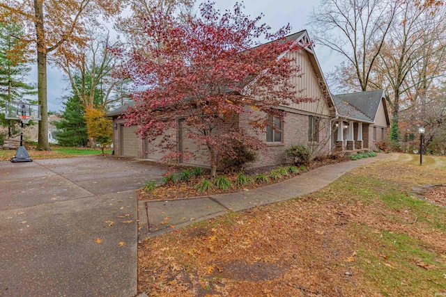 view of property exterior featuring a garage