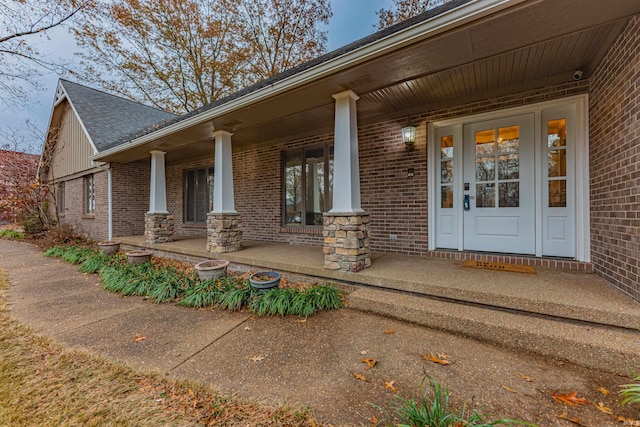 entrance to property with a porch