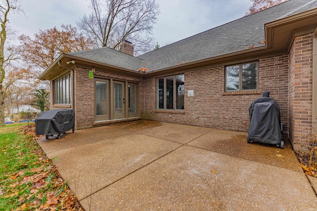 back of house with a patio area